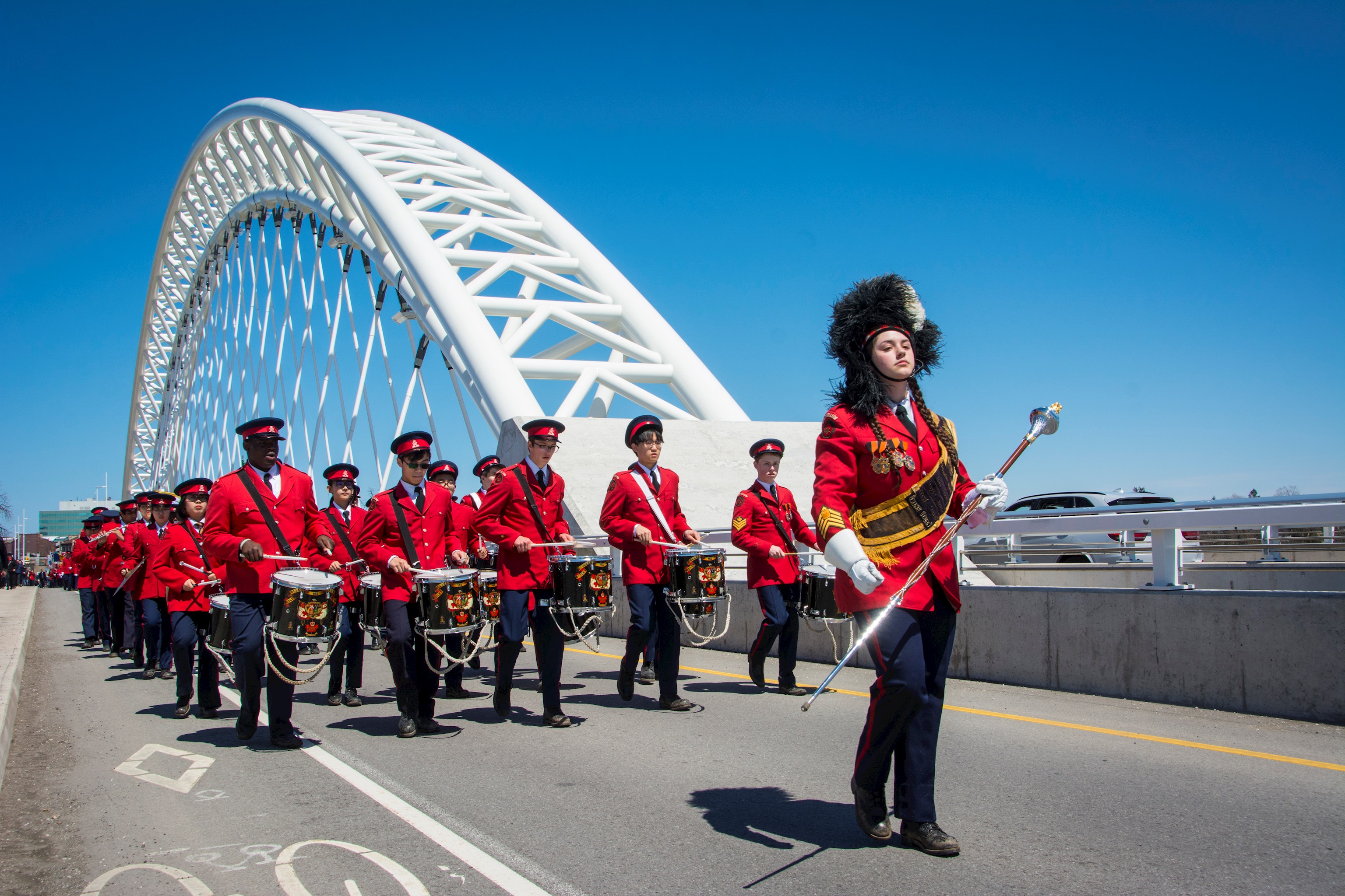 Ridley College marching band wlaking over bridge